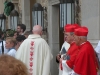 Fr. Peter with the key to open the door with Cardinals Rigali of Philadelphia and George of Chicago in the foreground.