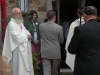 The procession enters after Fr. Peter opens the door.